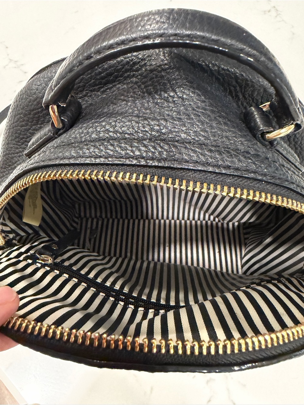 Kate Spade Black Pebbled Leather Backpack with Gold Hardware Striped Interior - Picture 6 of 9